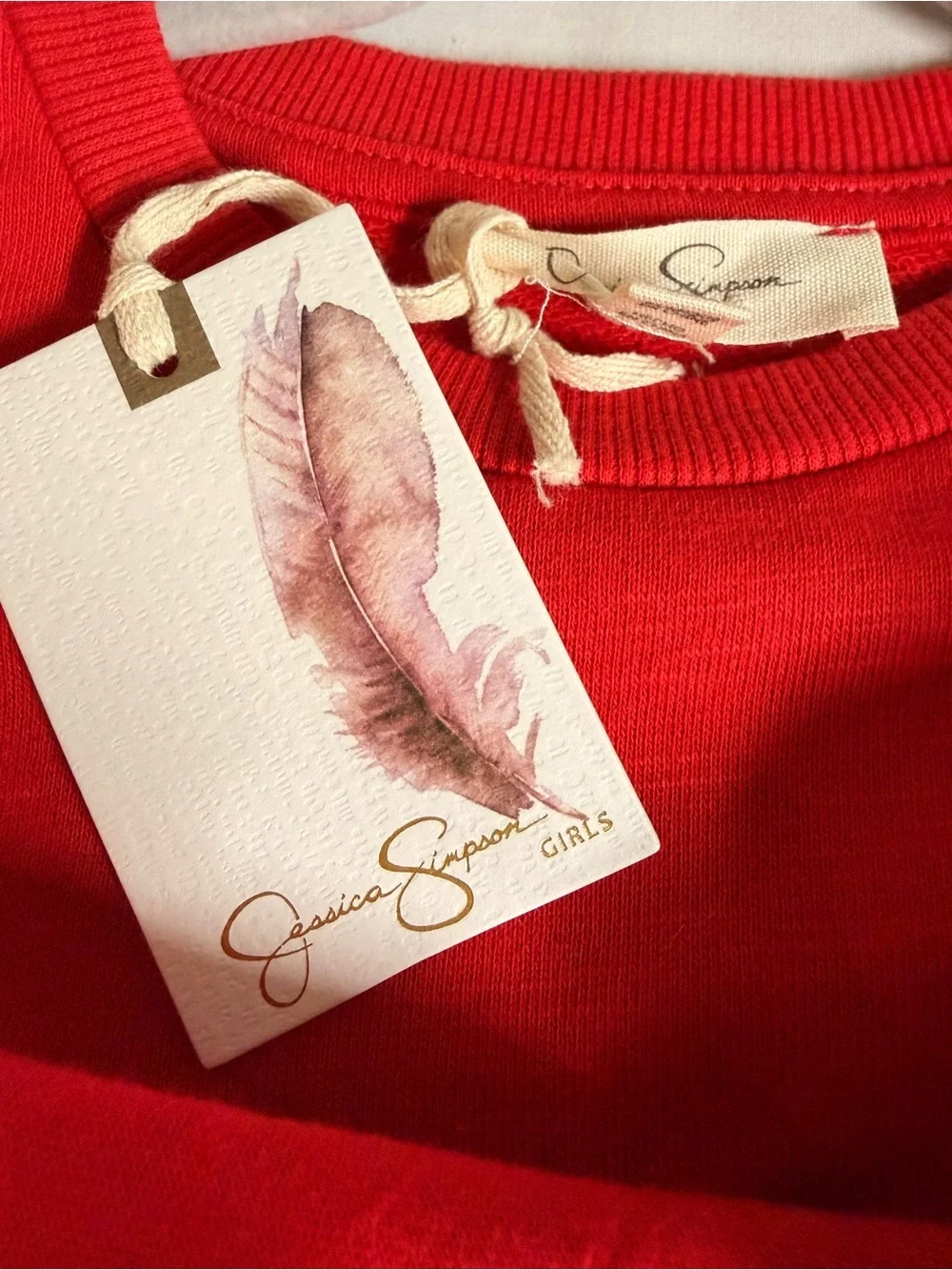 Jessica Simpson bright red